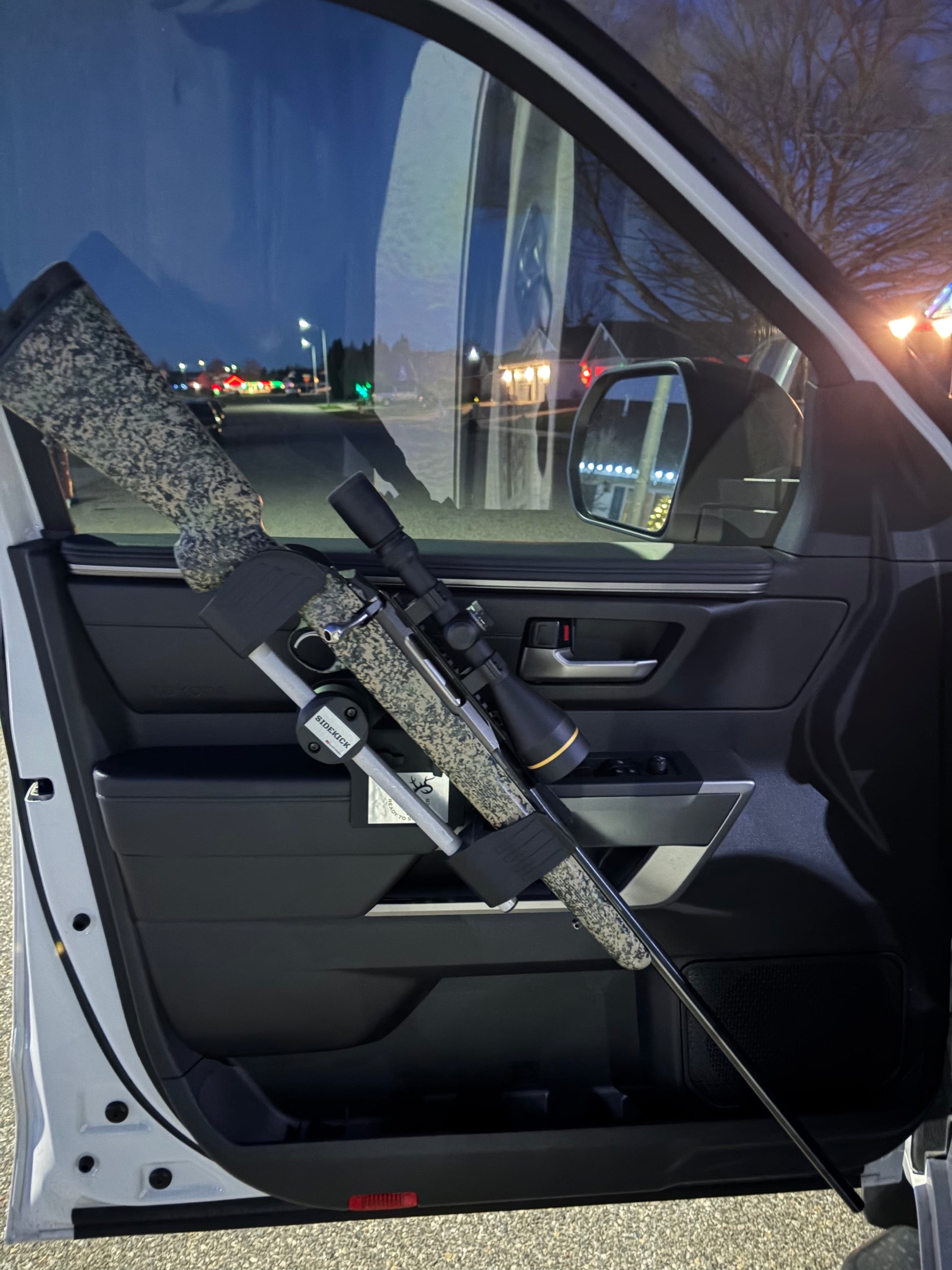 Sidekick door-mounted gun rack installed in a 2022-2026 Toyota Tundra